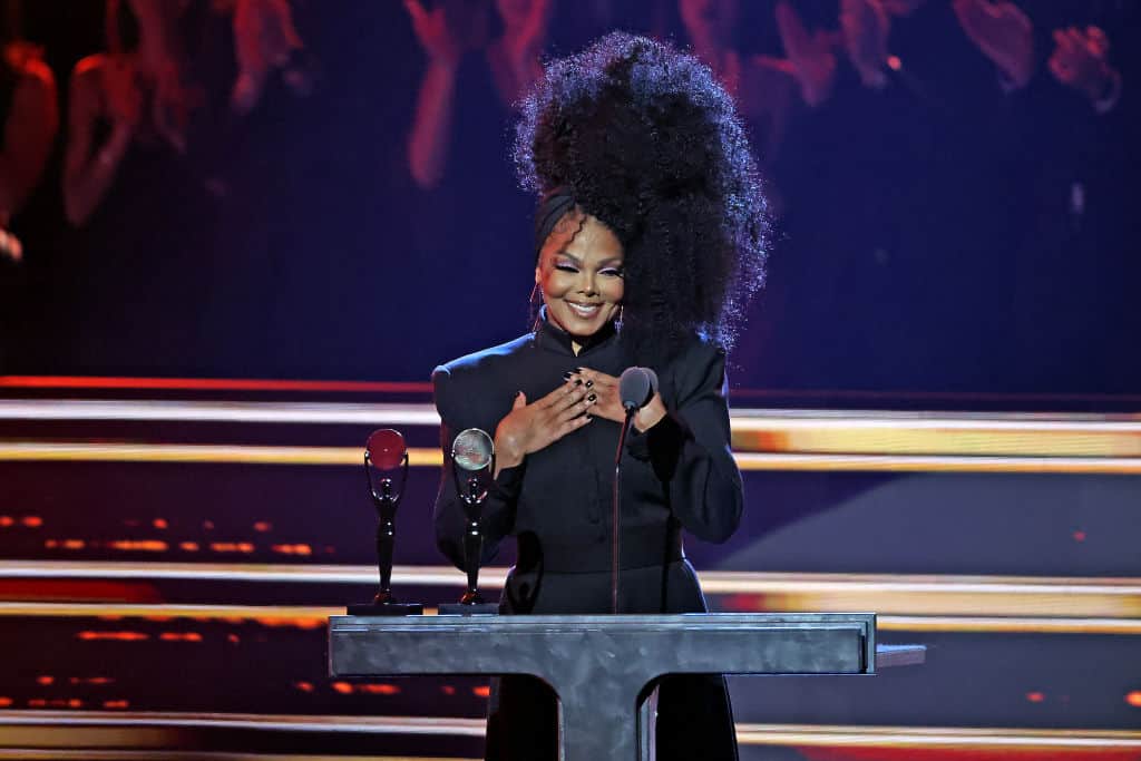 Social Media Reacts To Janet Jackson’s Steamy Kiss With Backup Dancer