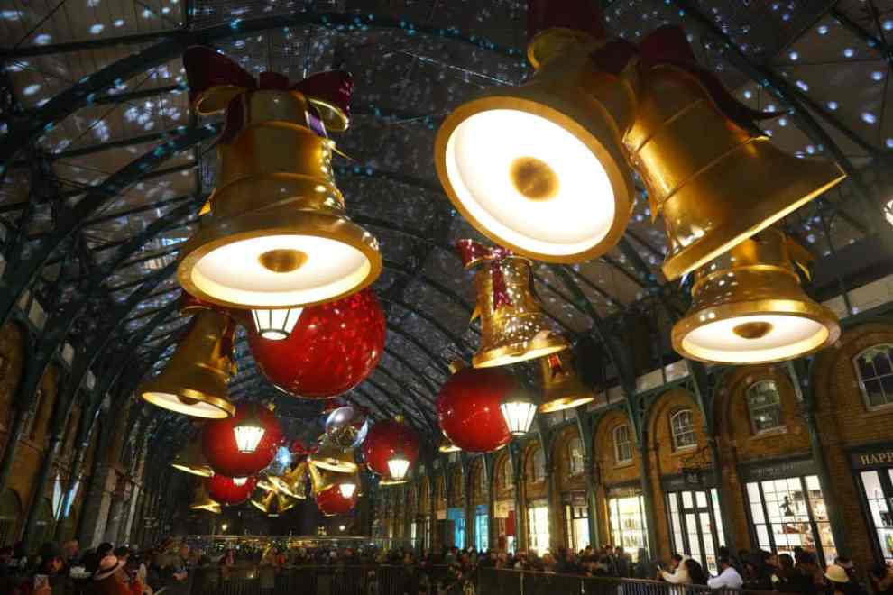 LONDON, ENGLAND - DECEMBER 4: Christmas lights are displayed in Covent Garden market on December 04, 2023 in London, England.