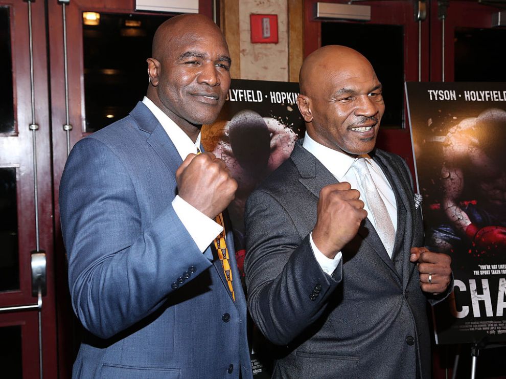 NEW YORK, NY - MARCH 12: Evander Holyfield (L) and Mike Tyson attend "Champs" New York Screening at Village East Cinema on March 12, 2015 in New York City.