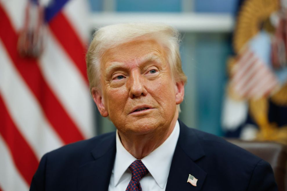 WASHINGTON, DC - JANUARY 20: President Donald Trump signs executive orders in the Oval Office on January 20, 2025 in Washington, DC. Trump takes office for his second term as the 47th president of the United States.