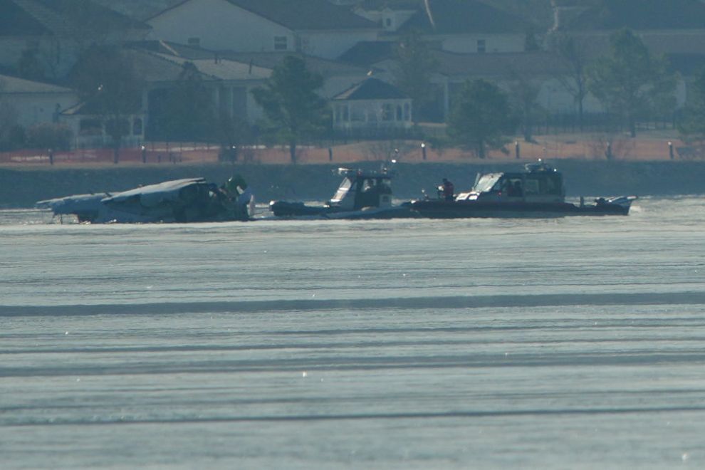ARLINGTON, VIRGINIA - JANUARY 30: Emergency response units search the crash site of the American Airlines plane on the Potomac River after the plane crashed on approach to Reagan National Airport on January 30, 2025 in Arlington, Virginia. The American Airlines flight from Wichita, Kansas collided midair with a military Black Hawk helicopter while on approach to Ronald Reagan Washington National Airport. According to reports, there were no survivors among the 67 people on both aircraft.