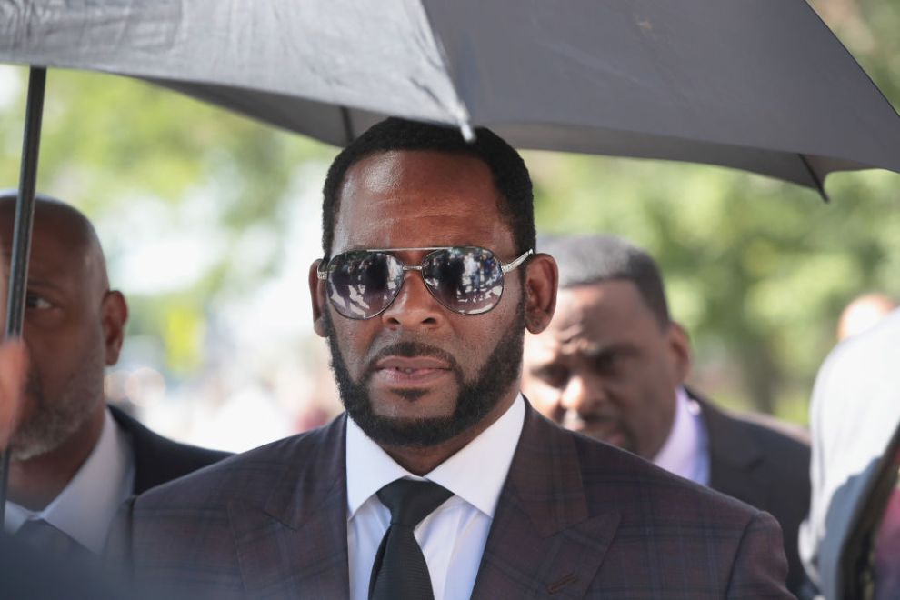 R&B singer R. Kelly leaves the Leighton Criminal Courts Building following a hearing on June 26, 2019 in Chicago, Illinois. Prosecutors turned over to Kelly's defense team a DVD that alleges to show Kelly having sex with an underage girl in the 1990s. Kelly has been charged with multiple sex crimes involving four women, three of whom were underage at the time of the alleged encounters.
