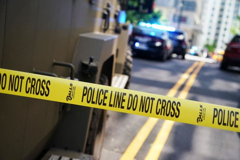 Police tape blocks off the area after a man shot four people in a building in Atlanta, Georgia, on May 3, 2023. One person was killed and three were injured in the southern US city of Atlanta on Wednesday when a gunman opened fire inside a building, police said, in the latest gun violence to hit the country.