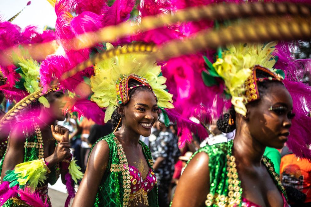 TOPSHOT - Participants dance as they parade during the Calabar Carnival in Calabar on December 28, 2024. Calabar Carnival is an annual carnival held in Cross River State, Nigeria: it is celebrated every December to mark Christmas celebration yearly. The quality of the festival has grown over the years making it Nigeria's biggest carnival and an internationally recognized festival.