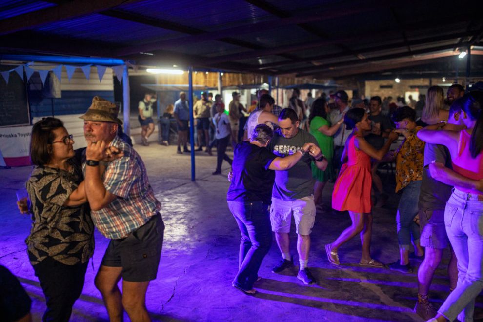 HOPETOWN, SOUTH AFRICA FEBRUARY 15: Afrikaners dance to traditional music on February 15, 2025 in Hopetown, Northern Cape Province, South Africa. The Hopetown farm show is a yearly event where thousands of people attend two days of horse races, entertainment, farm equipment displays, a strongman contest and rides for children. The show is the highlight of the year in this small farming town, made famous in 1867 when a boy found the first diamond in the area.