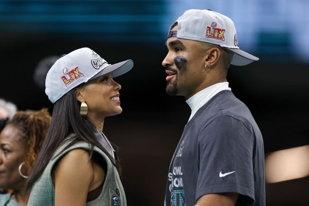Jalen Hurts #1 of the Philadelphia Eagles stands with fiancée Bry Burrows after winning Super Bowl LIX against the Kansas City Chiefs at Caesars Superdome on February 09, 2025, in New Orleans, Louisiana. The Eagles defeated the Chiefs 40-22.