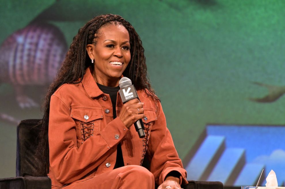 AUSTIN, TEXAS - MARCH 13: Michelle Obama speaks onstage at IMO Live: Michelle Obama, Craig Robinson & Dr. Laurie Santos during the 2025 SXSW Conference and Festival at Austin Convention Center on March 13, 2025 in Austin, Texas.