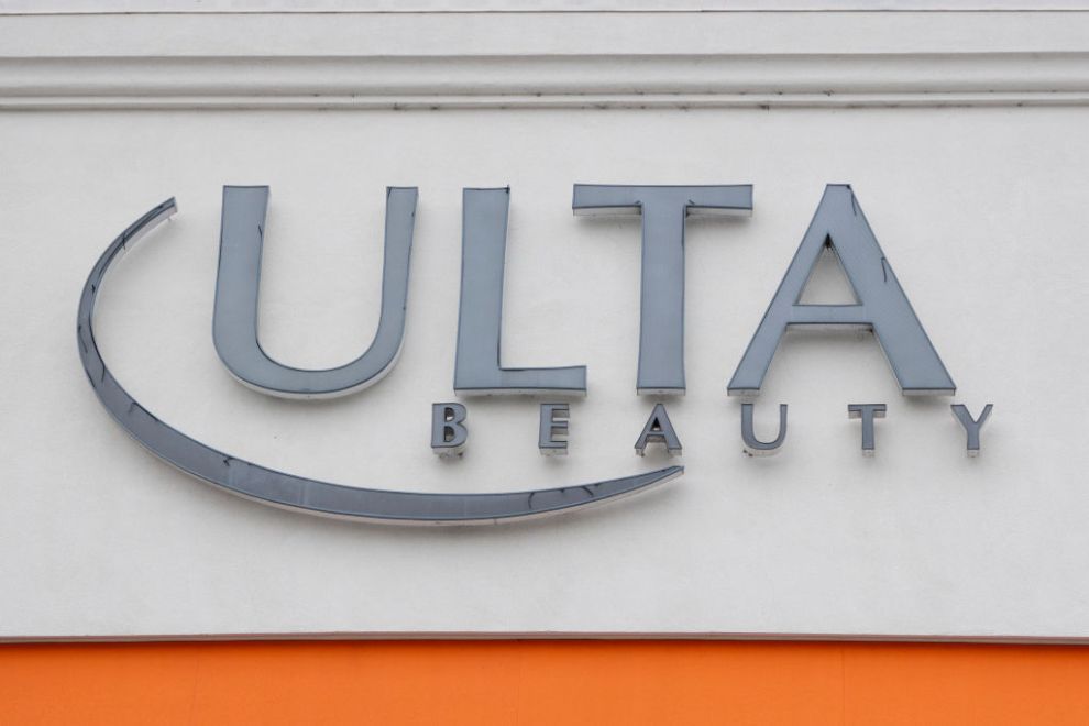 SAN DIEGO, CALIFORNIA - JANUARY 31: The Ulta Beauty corporate logo is displayed on a sign at their outlet store on January 31, 2025 in San Diego, California.